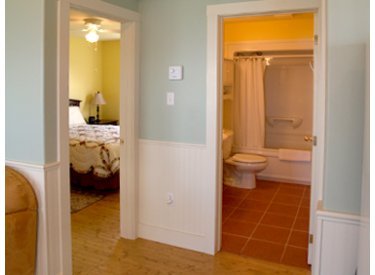 Mates Helm | Sunrise Shore Cottages | Hallway and bathroom